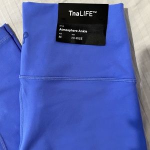 Never worn tags on TNA atmosphere ankle size M